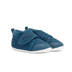 Stonz Cruiser Baby Shoe in Denim, supportive baby shoe with flexible sole and breathable fabric. ¾ turn view.