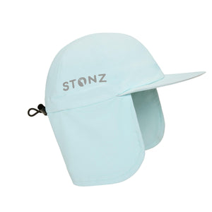 Stonz Flap Cap in Haze Blue with adjustable toggle. Sun hat made with moisture-wicking fabric with UPF 50 sun protection. Side view