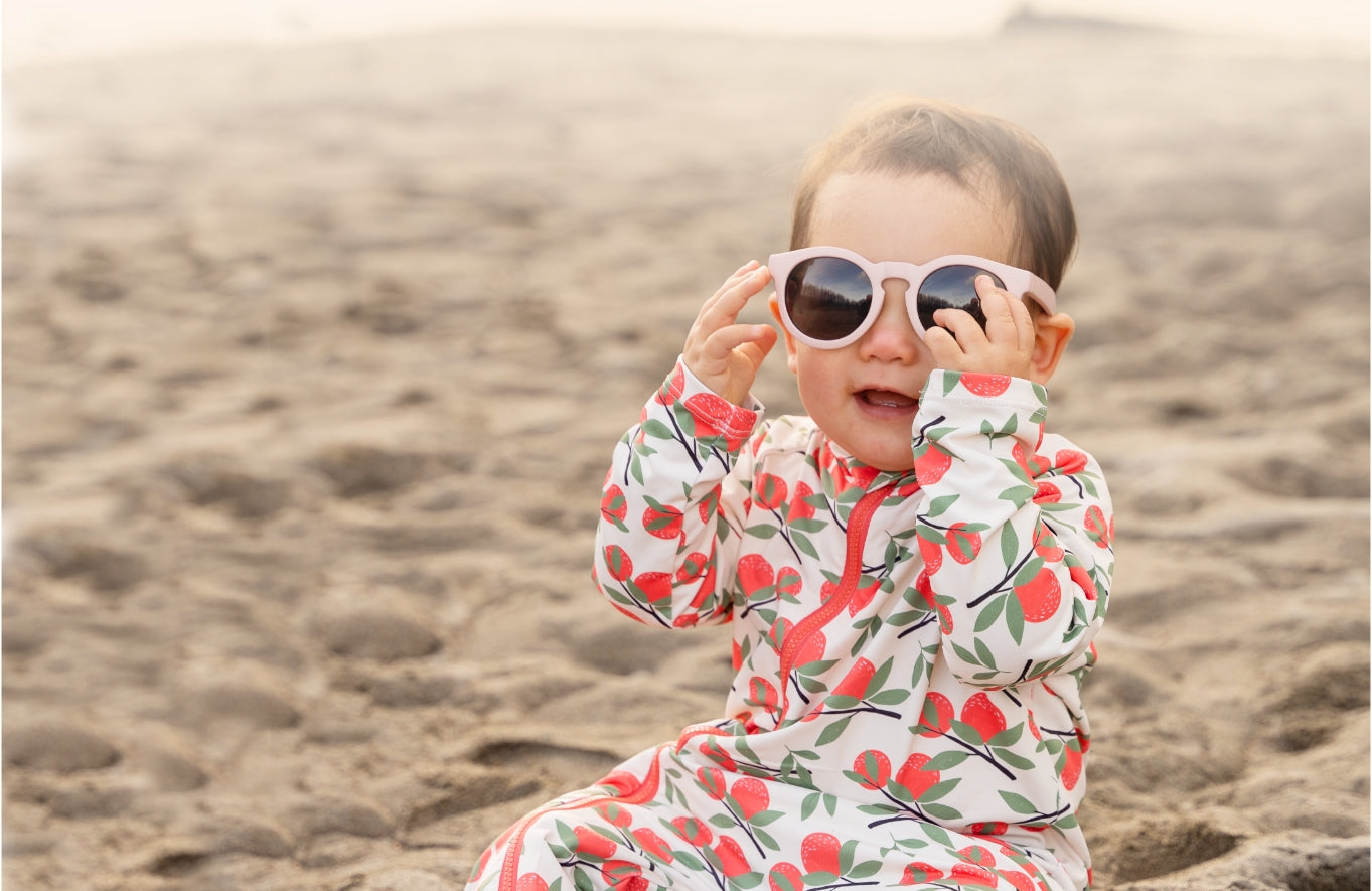 Cute baby in Stonz sunsuit citrus color