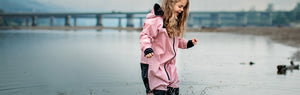 Happy kid in Stonz Rainsuit - Dusty Rose color