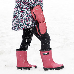 happy kid in Stonz rainboots and snow mitts