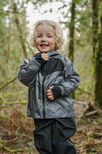 Cute little kid in stonz waterproof Rain Jacket