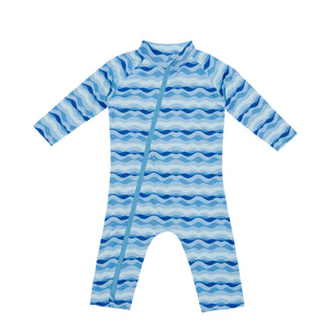 Stonz Sunsuit in waves front view.