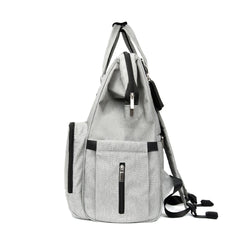 Stonz Diaper Backpack with functional and spacious storage in Light Grey, Side View.