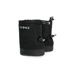 Stonz Winter Baby Booties in Black with adjustable toggles, weather resistant material and non-slip soles. ¾ turn view.