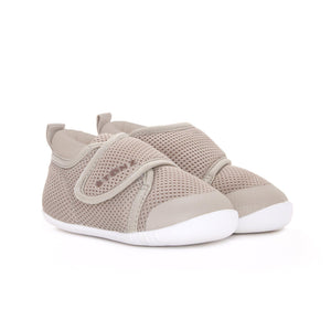 Stonz Cruiser Baby Shoe in Dune, supportive baby shoe with flexible sole and breathable fabric. ¾ turn view.