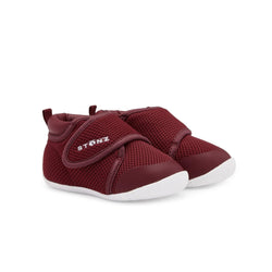Stonz Cruiser Baby Shoe in Ruby Tonal, supportive baby shoe with flexible sole and breathable fabric. ¾ turn view.