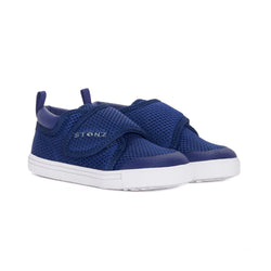 Stonz Cruiser Toddler Shoe in Navy. Supportive toddler runner with flexible sole and breathable fabric. ¾ turn view.