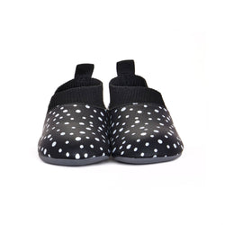 Stonz Yale Soft Sole Baby Slipper in Black - Polka Dot, made from all vegan materials. Front view.