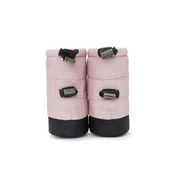 Stonz Winter Puffer Baby Booties in Haze Pink with adjustable toggles, weather resistant material and non-slip soles. Front view.